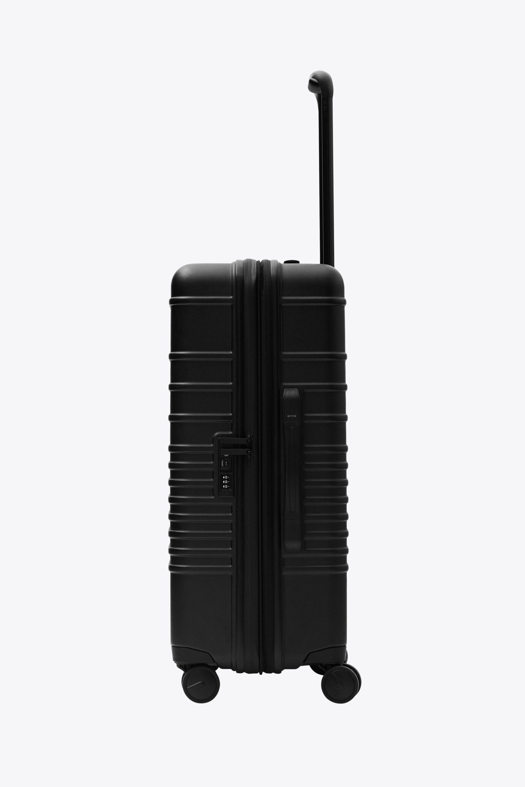 The Medium Check-In Roller in All Black - Image 6